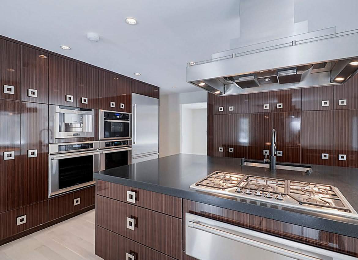 kitchen with dark brown custom cabinets