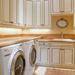 farmhouse style white cabinets in laundry room