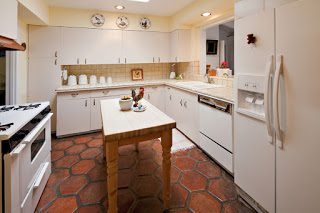 white custom cabinets in smaller kitchen